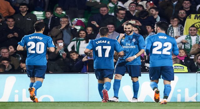 SEVILLE, SPAIN - FEBRUARY 18: Karim Benzema of Real Madrid celebrates after scoring his team's fifth goal during the La Liga match between Real Betis and Real Madrid at Benito Villamrin stadium on February 18, 2018 in Seville, Spain. (Photo by Aitor Alcalde/Getty Images)
