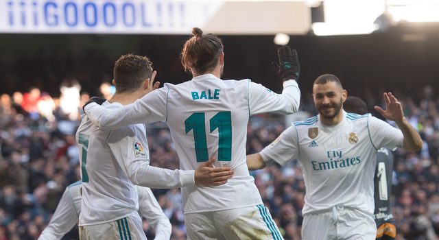 MADRID, SPAIN - FEBRUARY 24: Gareth Bale of Real Madrid celebrates with Karim Benzema after scoring his teamÕs 3rd goal during the La Liga match between Real Madrid and Deportivo Alaves at Estadio Santiago Bernabeu on February 24, 2018 in Madrid, Spain. (Photo by Denis Doyle/Getty Images)