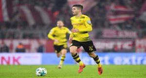 MUNICH, GERMANY - DECEMBER 20: Christian Pulisic of Dortmund plays the ball during the DFB Cup match between Bayern Muenchen and Borussia Dortmund at Allianz Arena on December 20, 2017 in Munich, Germany. (Photo by Sebastian Widmann/Bongarts/Getty Images)