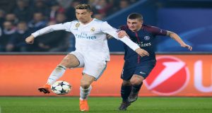 PARIS, FRANCE - MARCH 06: Cristiano Ronaldo of Madrid is challenged by Marco Verratti of Paris during the UEFA Champions League Round of 16 Second Leg match between Paris Saint-Germain and Real Madrid at Parc des Princes on March 6, 2018 in Paris, France. (Photo by Matthias Hangst/Bongarts/Getty Images)