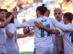 Real Madrid's Welsh forward Gareth Bale (C) celebrates a goal with teammates during the Spanish League football match between UD Las Palmas and Real Madrid CF at the Gran Canaria stadium in Las Palmas on March 31, 2018. / AFP PHOTO / DESIREE MARTIN (Photo credit should read DESIREE MARTIN/AFP/Getty Images)
